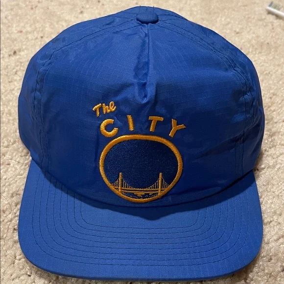 MITCHELL & NESS WARRIORS “THE CITY” WATERPROOF ZIPBACK